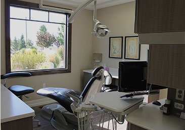 interior of our practice with dental chair and equipment